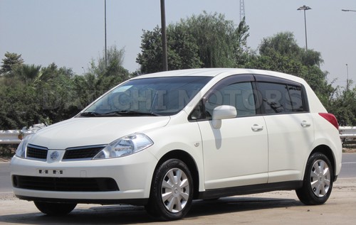 Nissan - Tiida                            